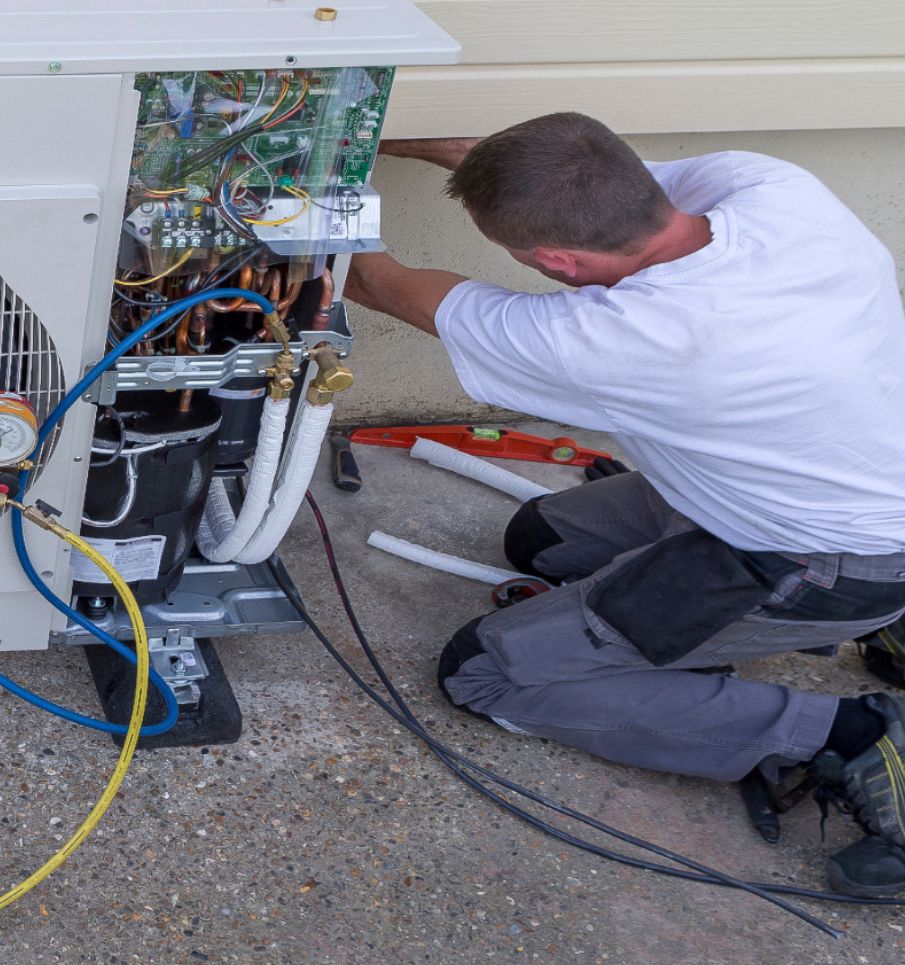 Man Repairing Air Conditioning