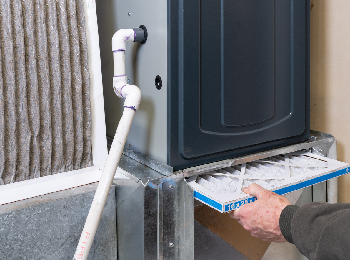 Furnace filter being removed
