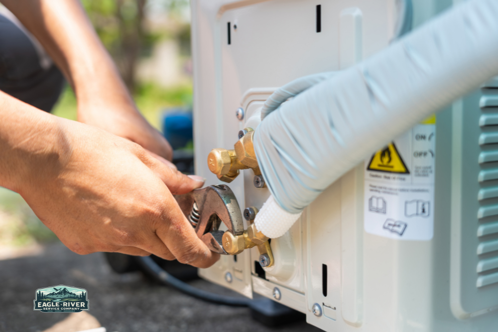 HVAC technician fixing an AC unit