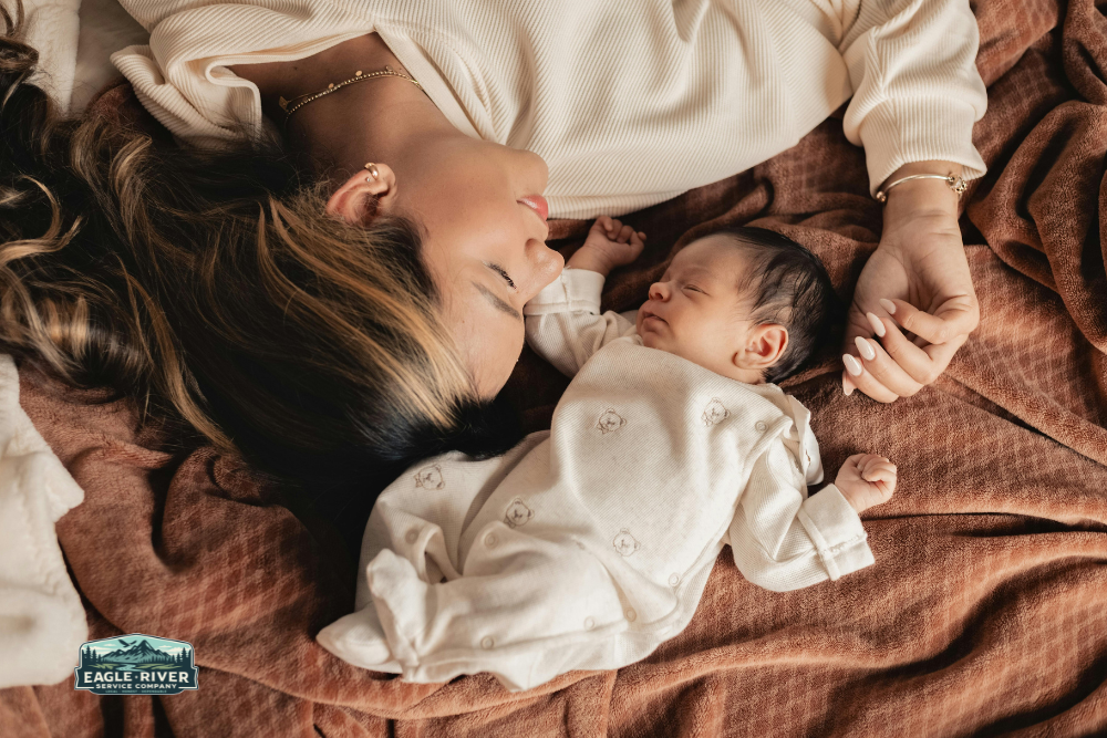 mom laying down with a baby comfortably