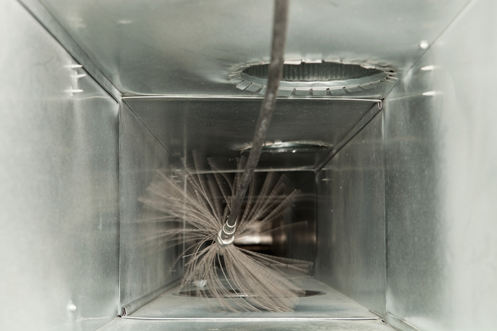 spinning brush cleaning inside air ducts