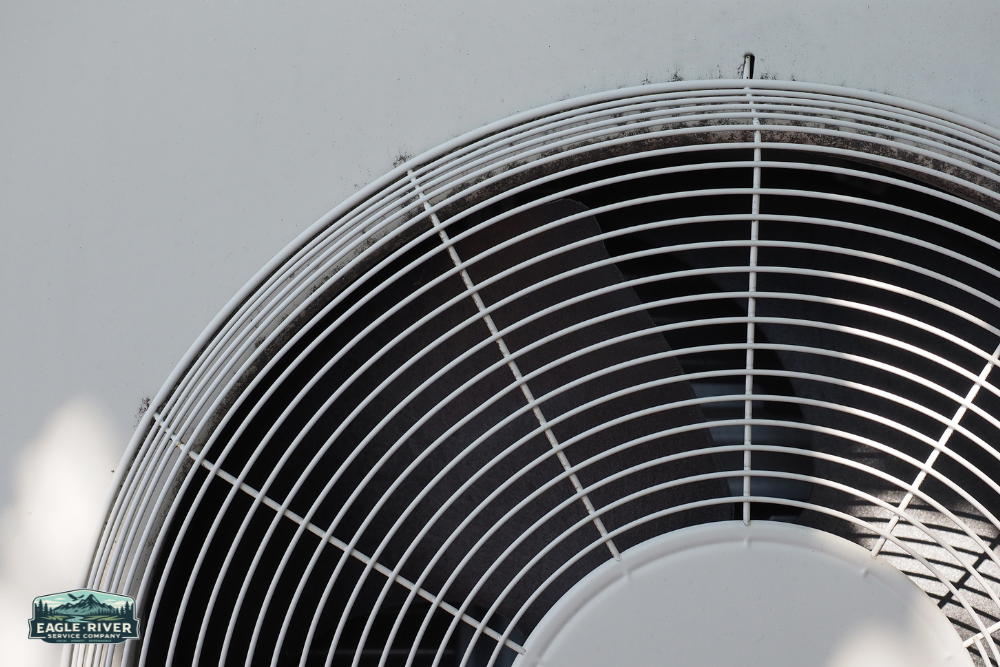 white ac unit with wire cover