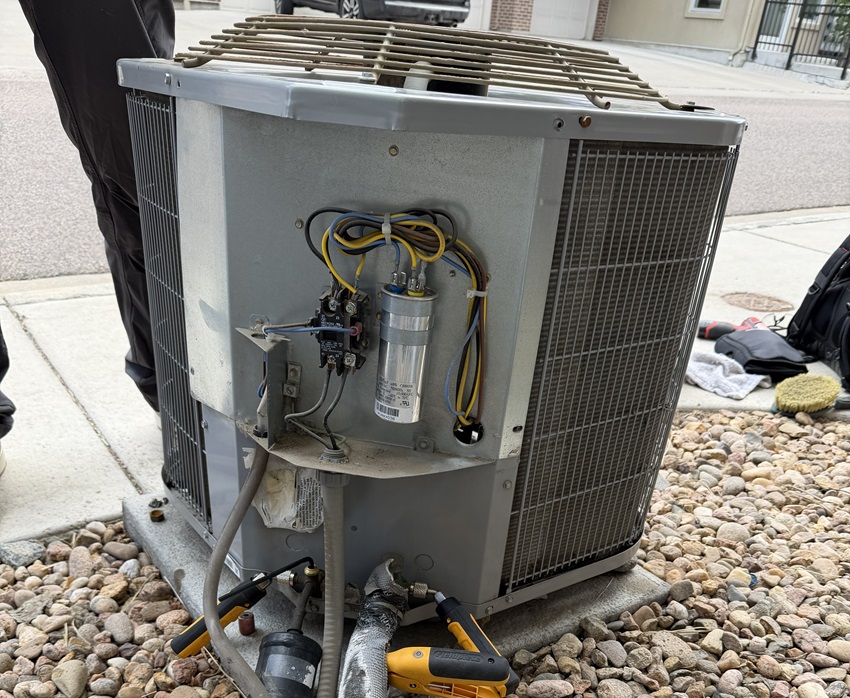air conditioner being repaired