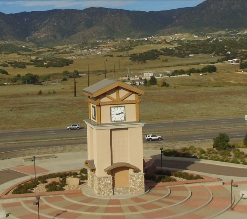 Monument colorado large clock tower in a circular patio