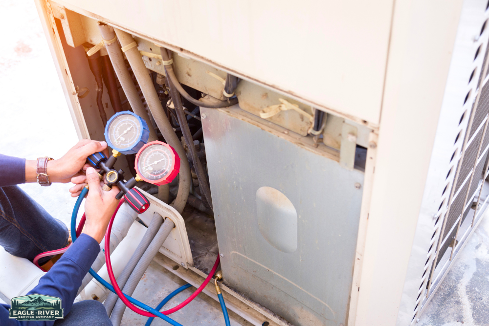 Technician checking a/c refrigerant