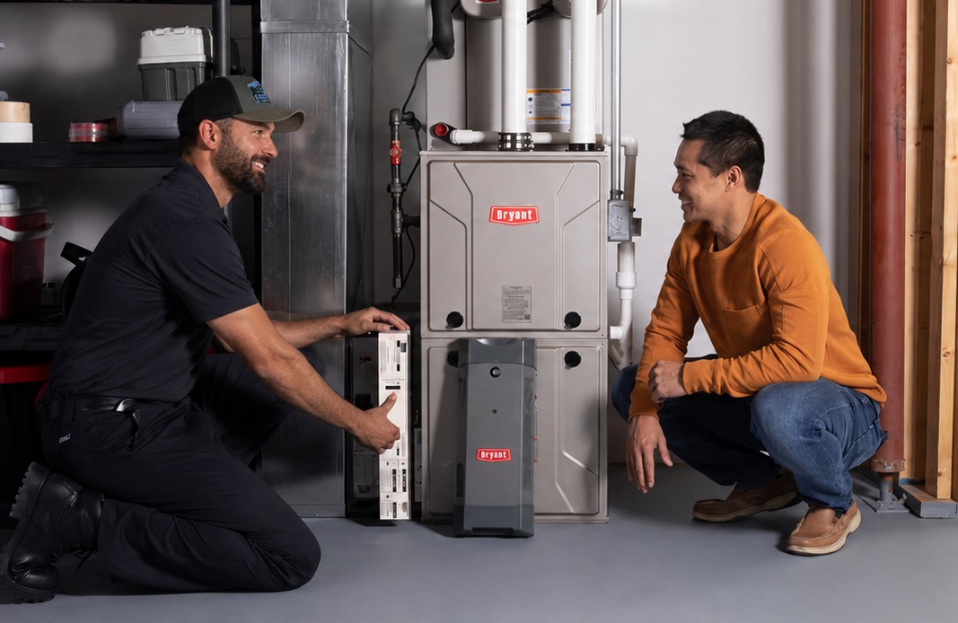 man installing a new Bryant furnace